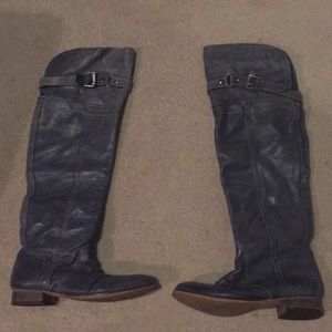 Steve Madden knee-high boots.